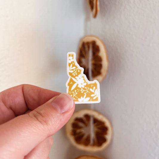 *mini* idaho syringa state outline sticker image 0